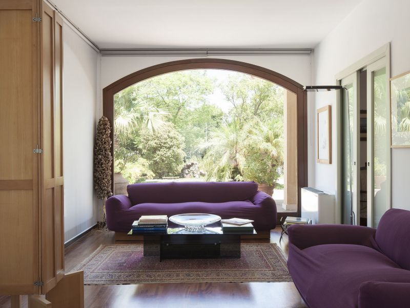 Living room with swimming pool view